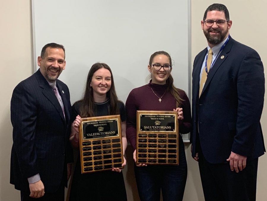Principal, Frank Pugliese, Valedictorian, Jackie Holden, Salutatorian, Stephanie Searing, and Assistant Principal John Holownia pose for a photograph with the updated Valedictorian and Salutatorian plaques.