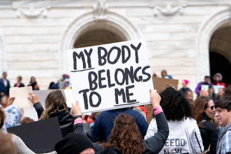 My Body Belongs To Me sign at a Stop Abortion Bans Rally in St Paul, Minnesota by Lorie Shaull. Licensed under CC BY-SA 2.0.