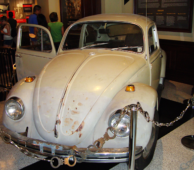 Image of Ted Bundys tan Volkswagen beetle that he drove while kidnapping his victims. The car is now kept in the Alcatraz museum where this picture was taken. 